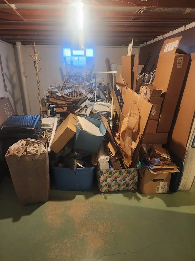 Roll-off dumpster container at job site for 15 Yard Dumpster Rental in Jones